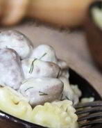 Куриные сердечки в сырном соусе