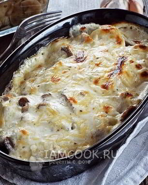 Пельмени с опятами и сыром в духовке