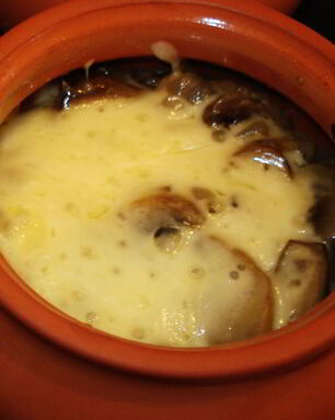 Фаршированные кальмары в горшочке