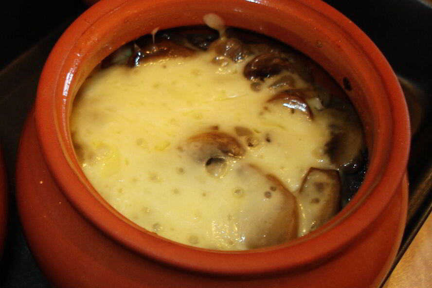 Рецепт фаршированных кальмаров в горшочке