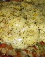 Пангасиус с овощами, запеченный под сыром