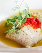 Треска в чесночном соусе