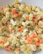 Салат Оливье с кальмарами