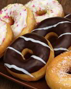 Творожные пончики в белом шоколаде